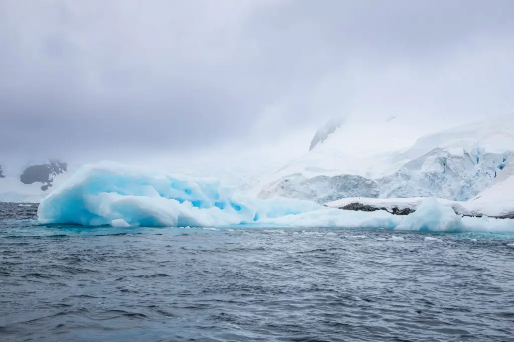 another photo of a blue colored iceberg