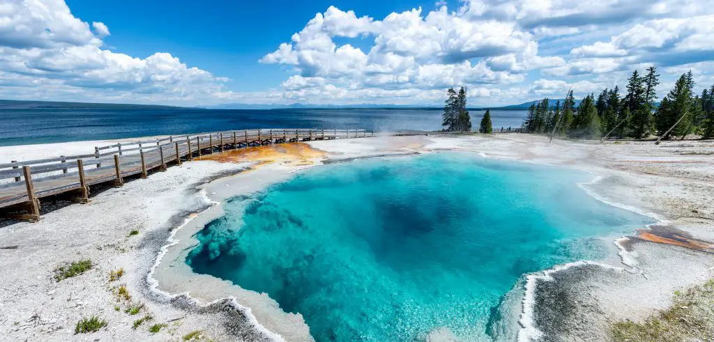 Summer Travel 2021: best family vacation destinations featured by top US BIPOC travel blogger, Momma Wanderlust -Geyser at Yellowstone National Park