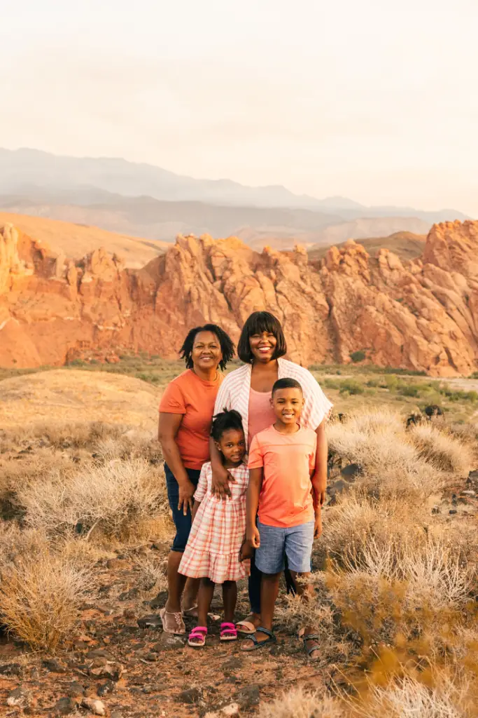 photo of woman and two children with older woman in Utah in front of mountain