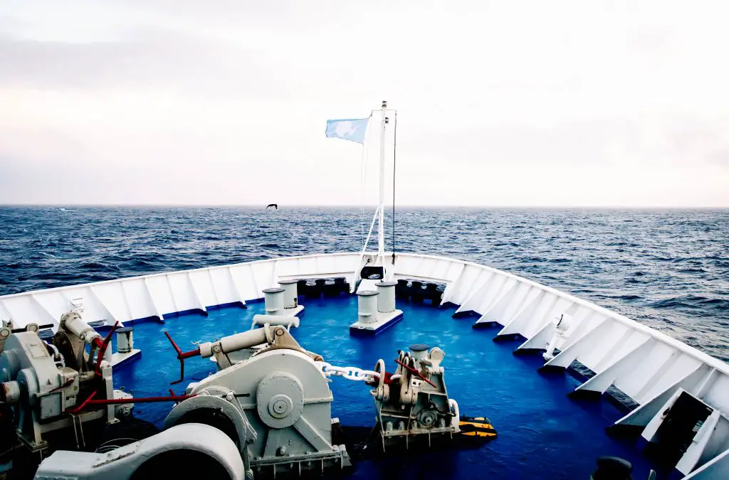 front of ship with the Antarctica flag at the mast