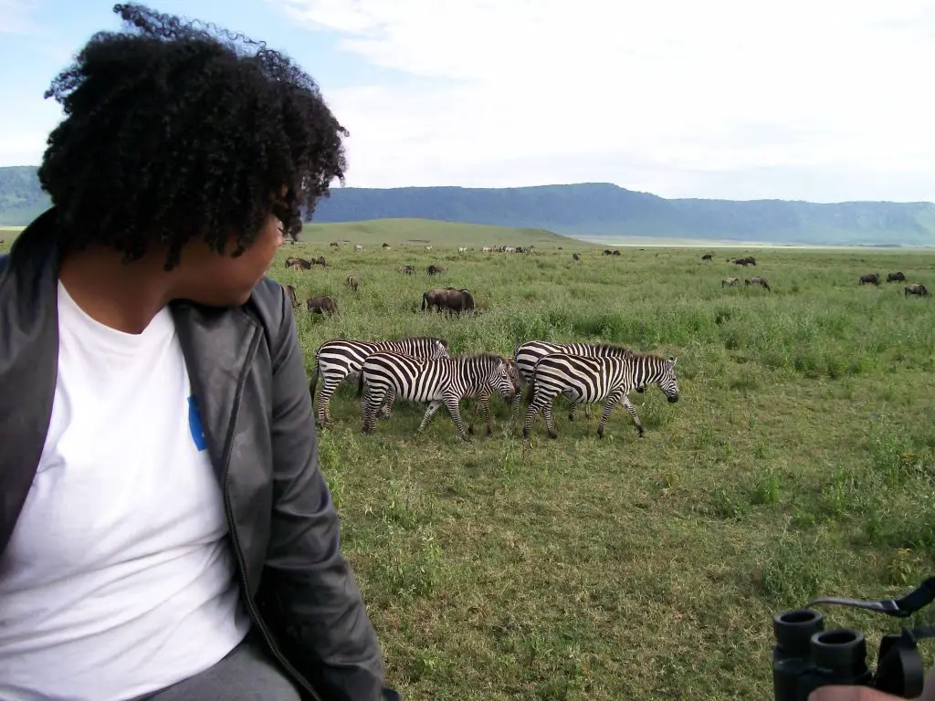 Me looking at zebra in Ngorongoro crater
