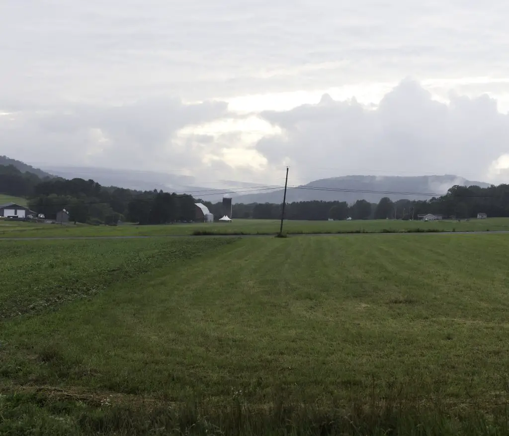 open field in deep creek, maryalnd Shows a farm setting.