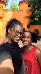 Woman and daughter smiling